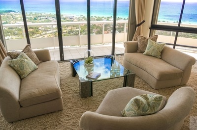 divide a large sectional sofa to open up the living space, Penthouse staging Aventura Florida